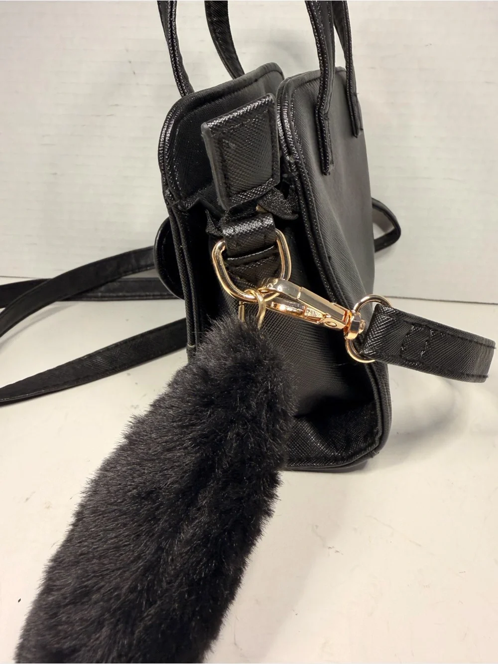 Sanrio Hello Kitty Black Faux Leather Crossbody Handbag with Pom Pom Charm